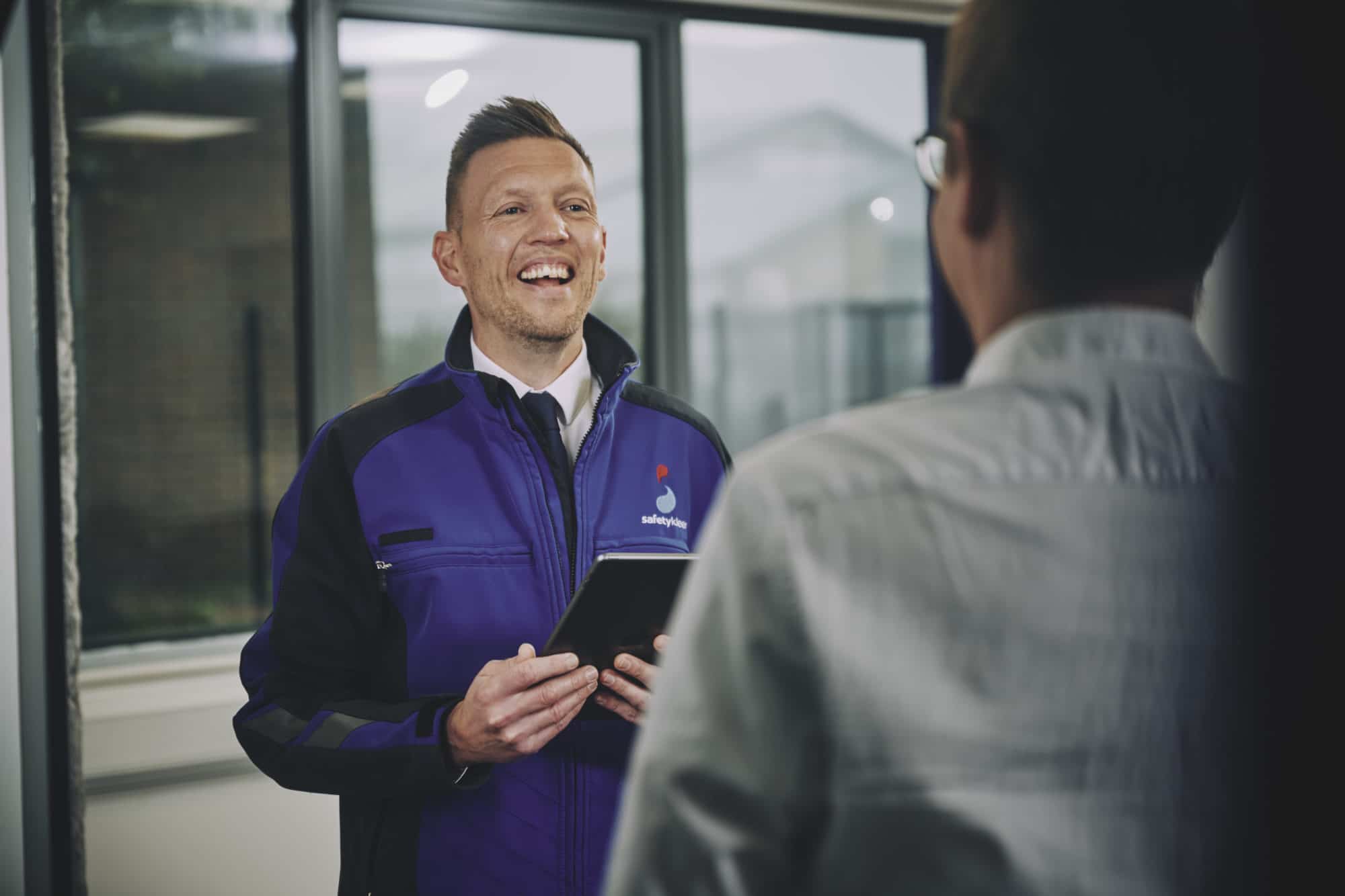 safetykleen staff talking with client